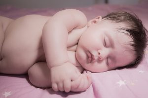 Cranial osteopathy treatment baby sleeping