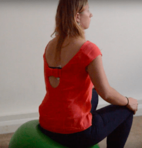 Swiss ball pelvic tilt exercise